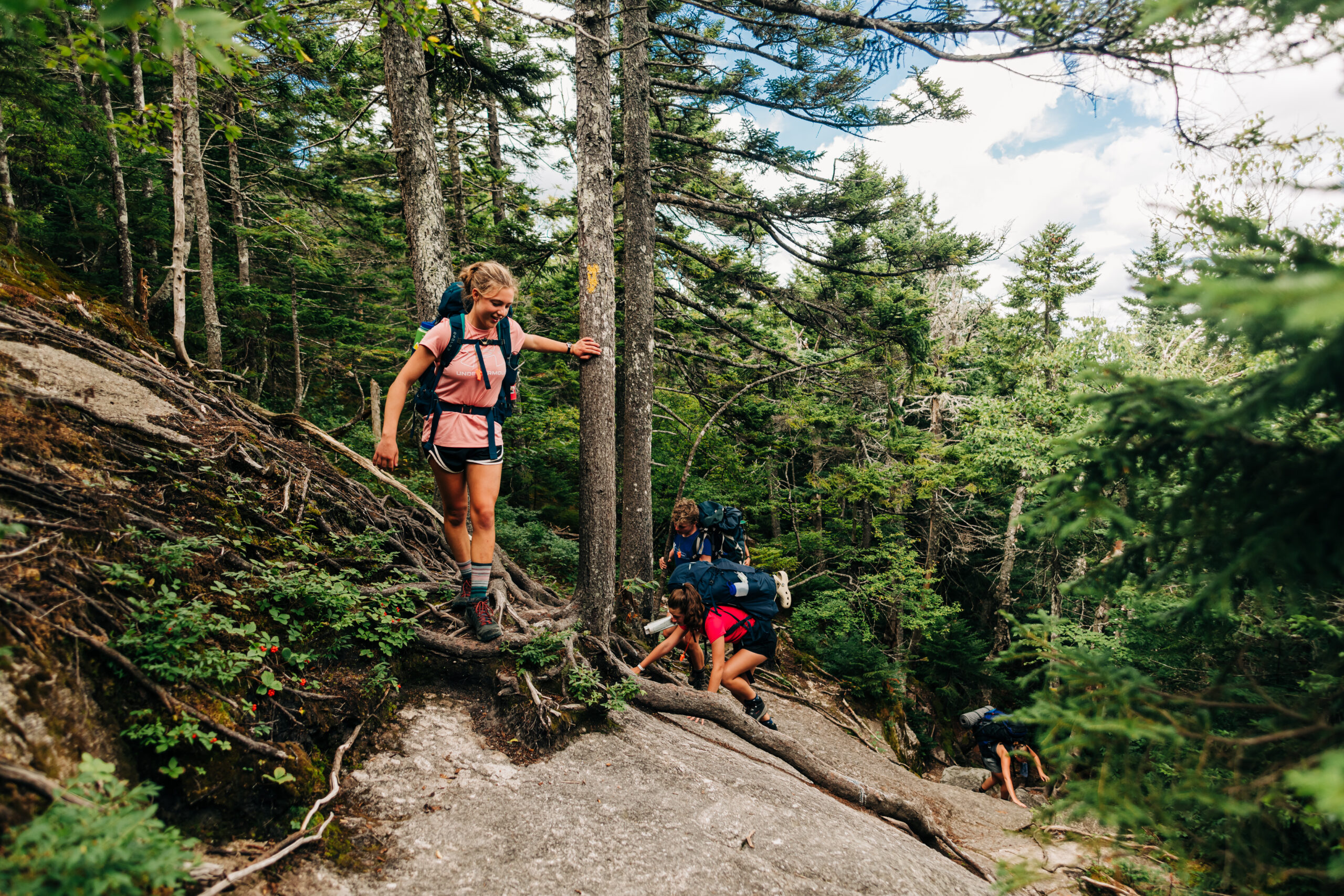Aug. 11, 2022. Cardigan Mountain State Forest, New Hampshire-- Photo by Corey David Photography. Hikers on Cardigan Mountain, NH